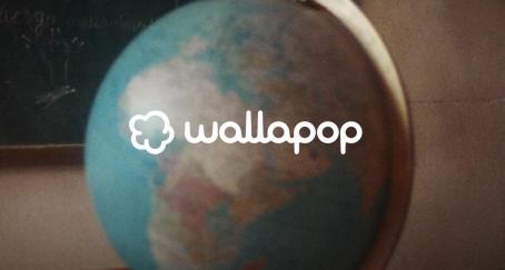 Logotipo de Wallapop sobre globo terráqueo